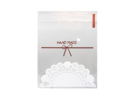 BOLSITA DE GALLETITA 50P (10X10X3) TEJIDO BLANCO