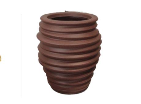 Imagen miniatura de PLANTERA WAVE REDONDO 82 MARRON